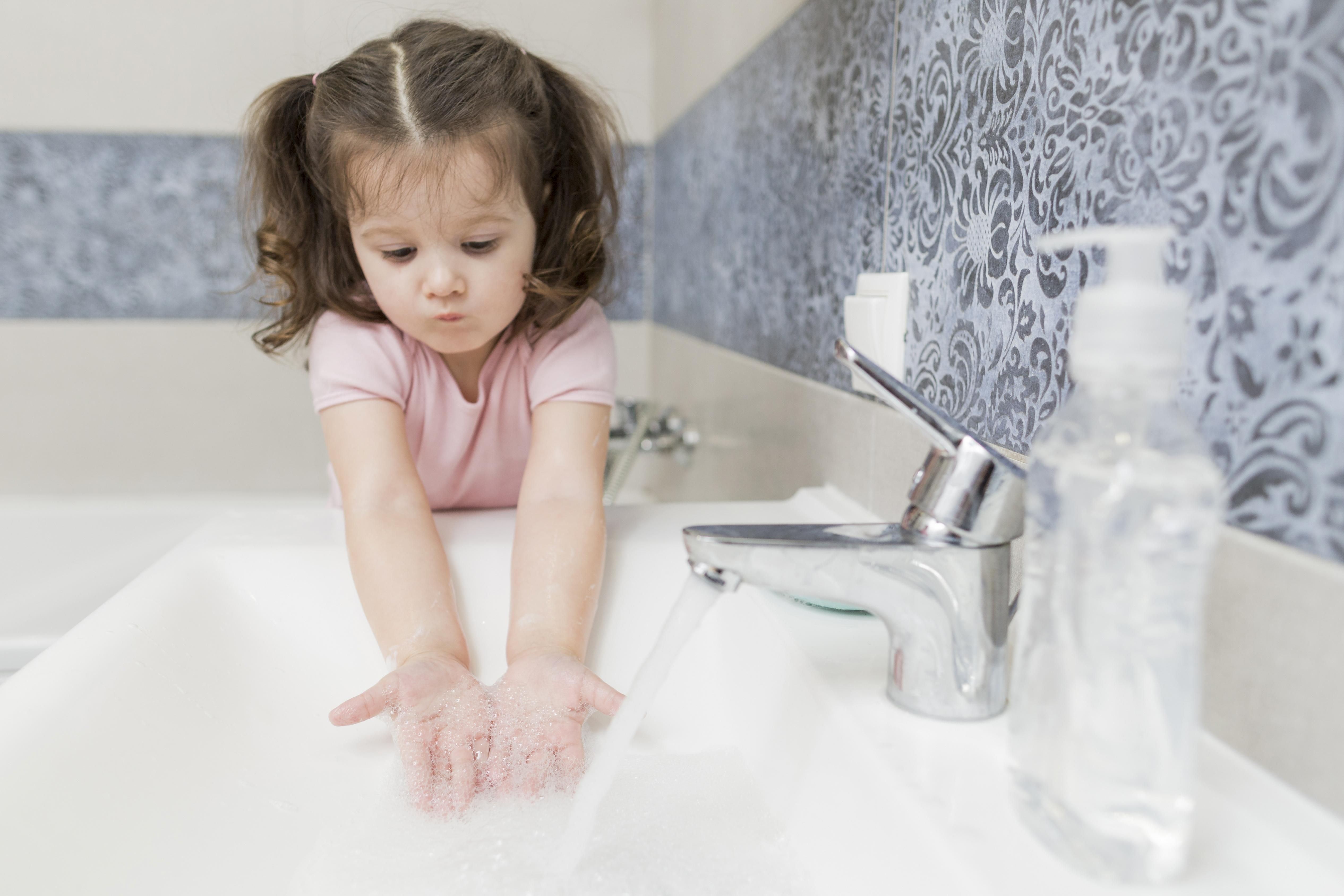 Girl Washing Hands Sink