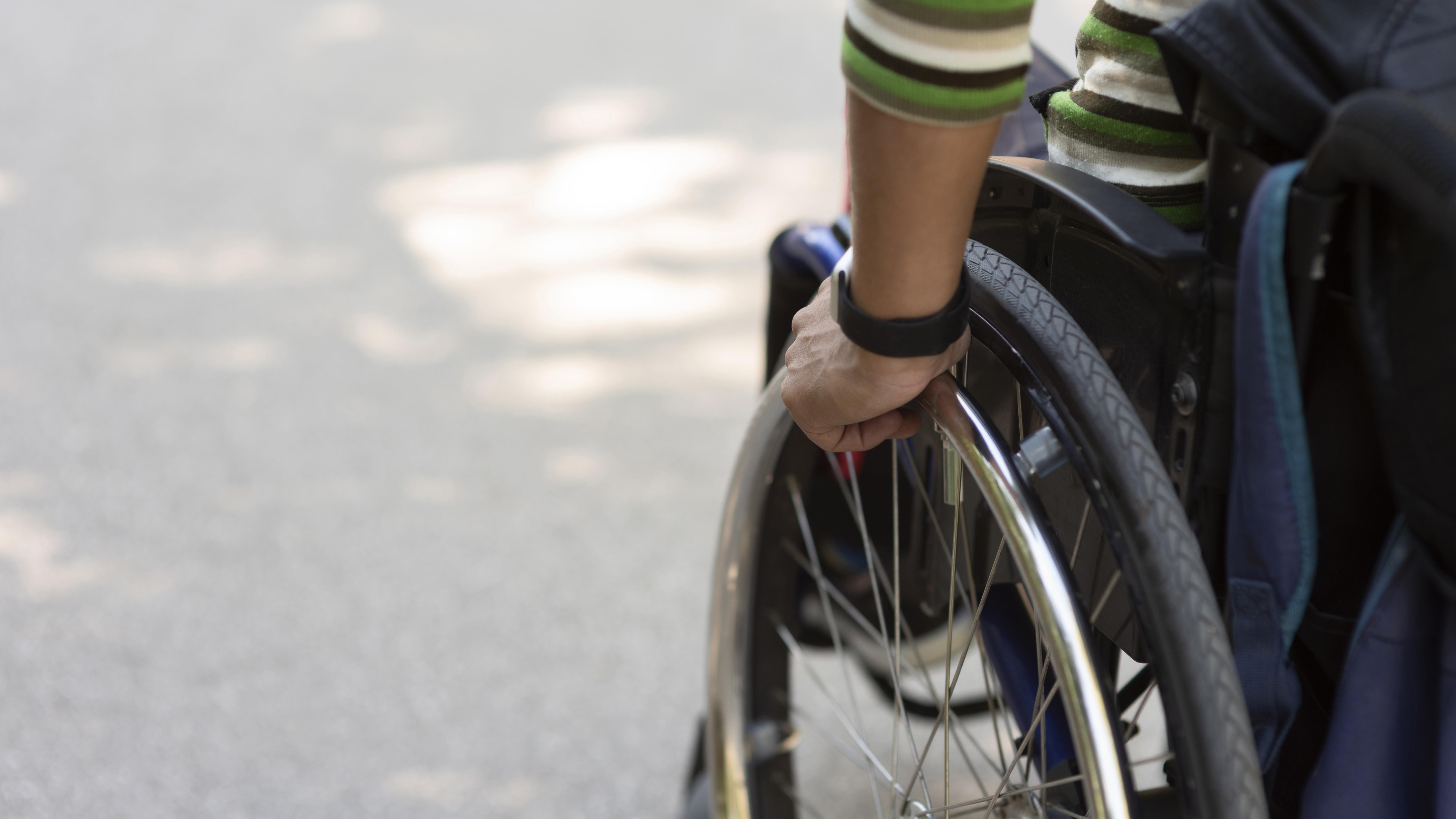 Close Up Hand Moving Wheel