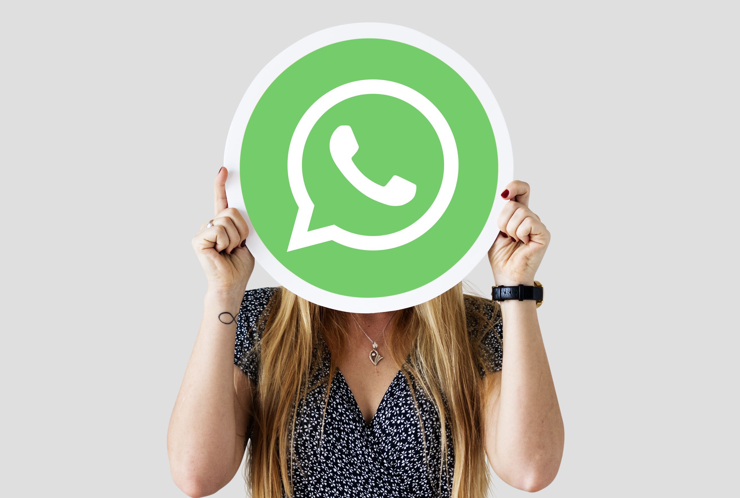 Woman Showing Whatsapp Messenger Icon